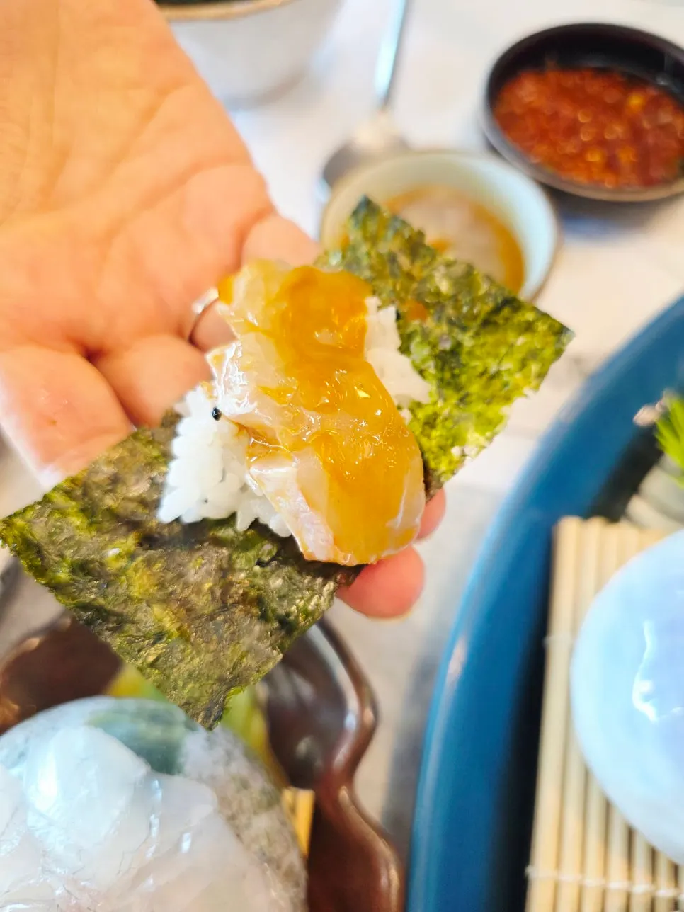 White fish sashimi topped with konowata