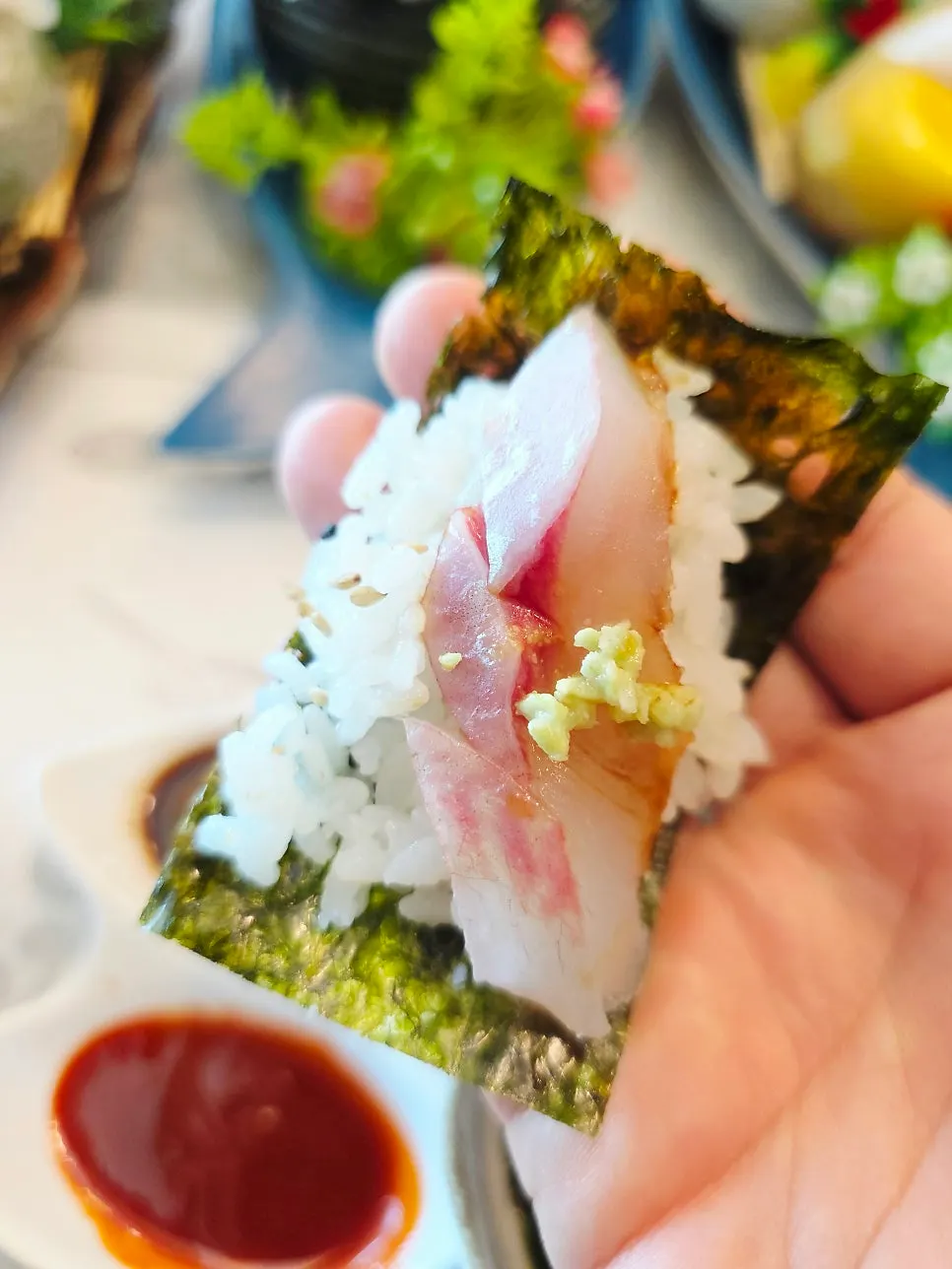 Rice and sashimi wrapped in seaweed