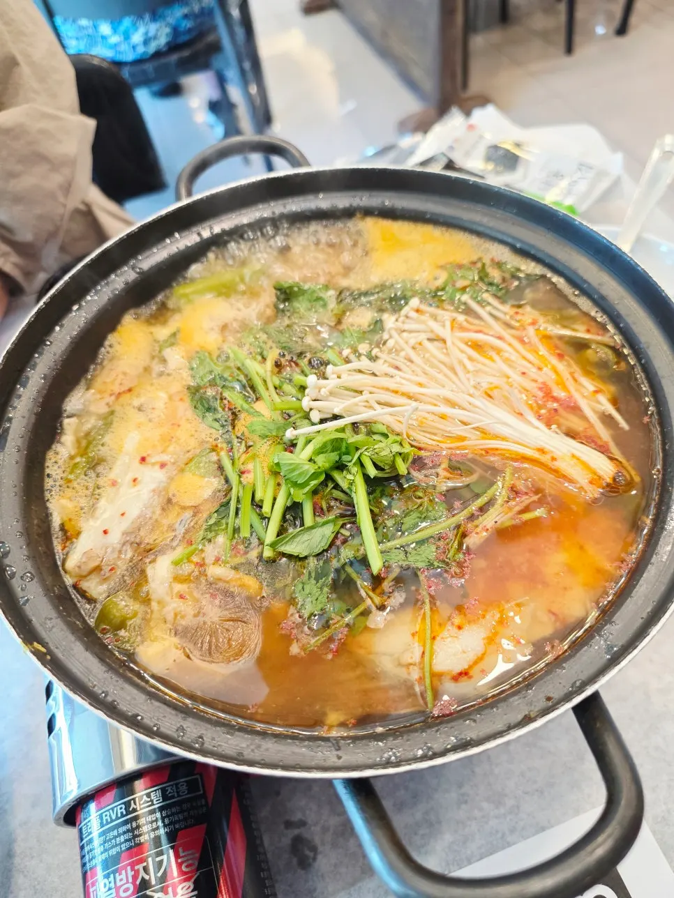 Spicy fish stew served at the end of the meal