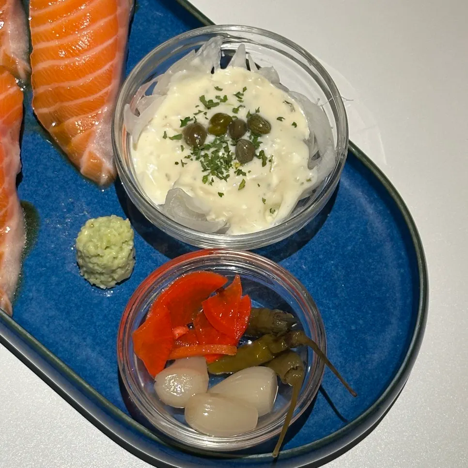 Giant salmon sushi enjoyed with rice