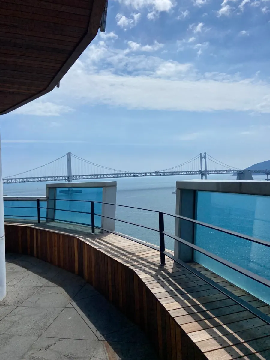 Outdoor terrace seating overlooking Gwangalli beach