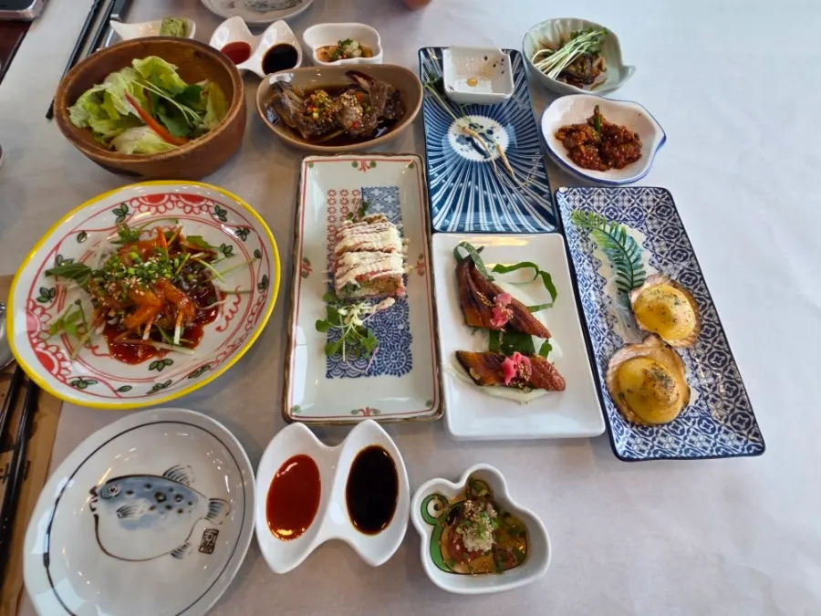 Sashimi appetizer spread with soy-marinated crab and grilled eel