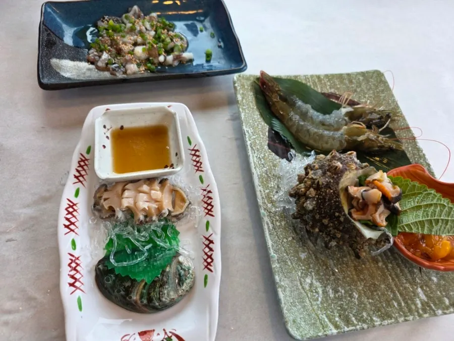 Assorted seafood plate with live octopus tangtangi and abalone sashimi