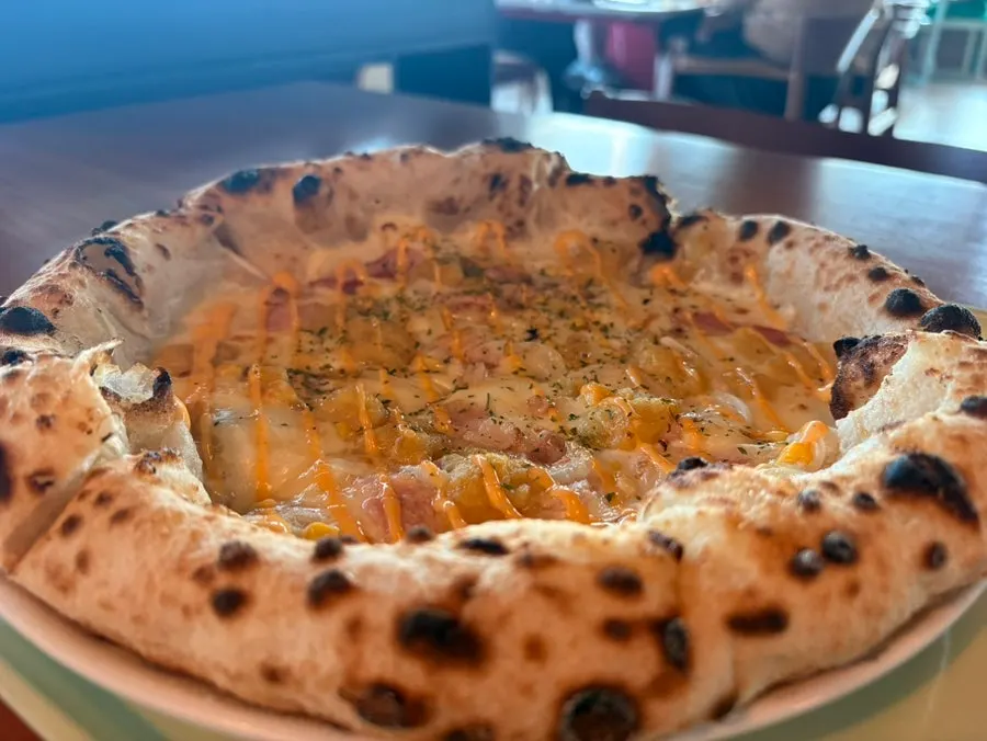 Whole honey sweet potato pizza fresh from the wood-fired oven