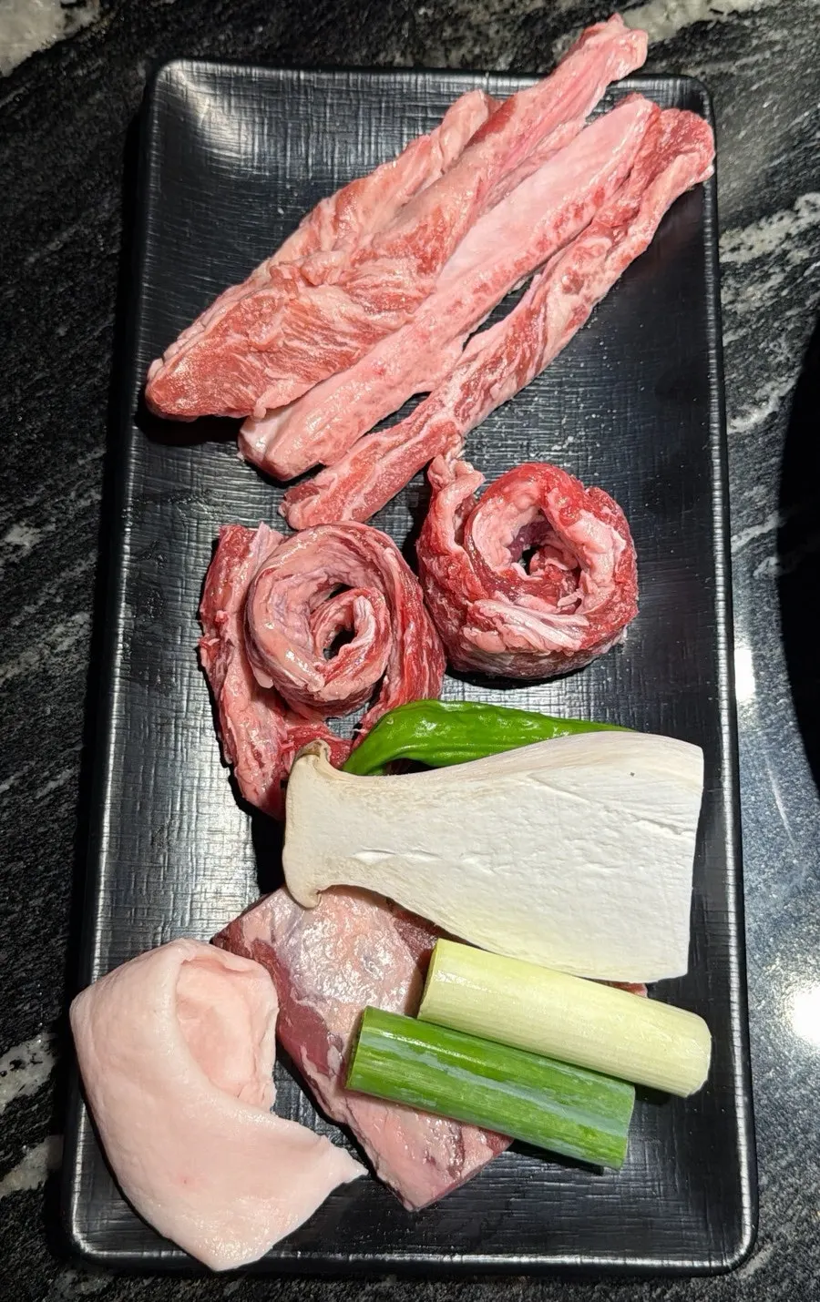Iberico meat being grilled on the grill