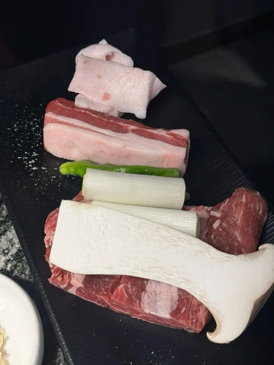 Plate of raw pork belly and Iberico pluma