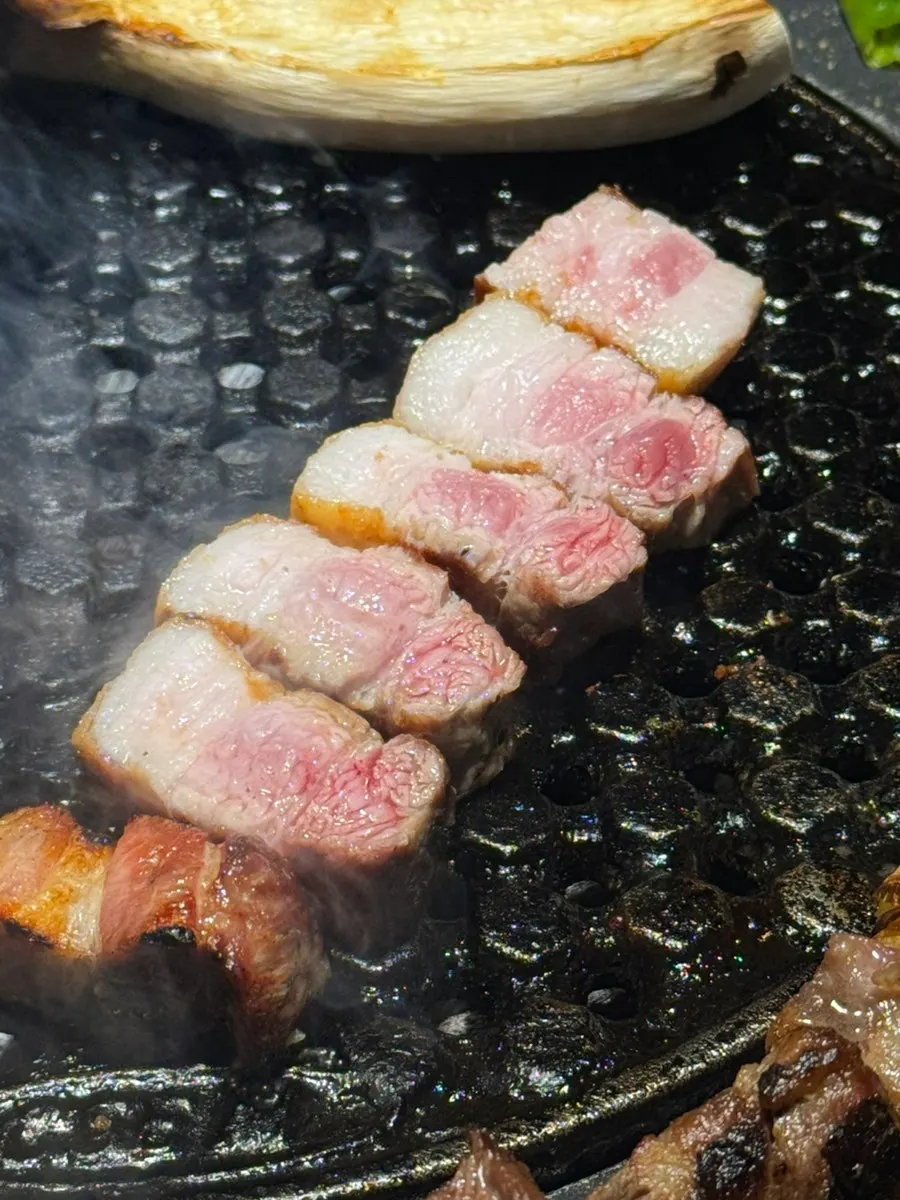 Grilled aged raw pork belly