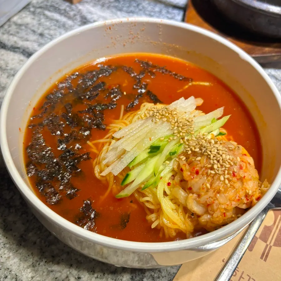 Kimchi noodle soup ordered alongside the meat