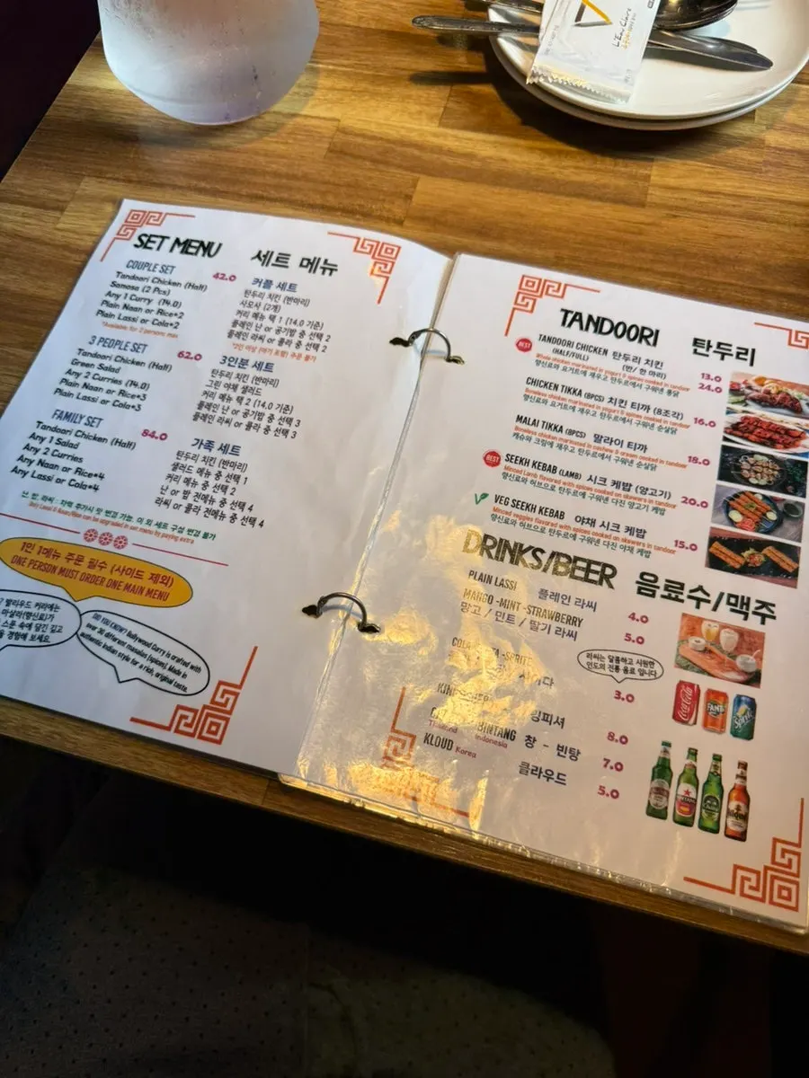 Bollywood's menu listing curries, naan, kebabs and tandoori chicken