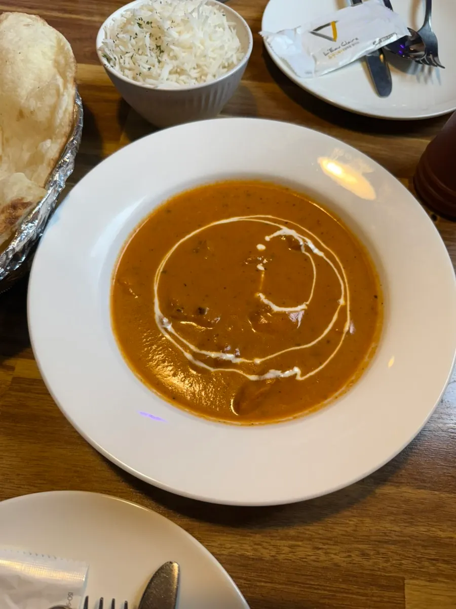 Butter chicken curry with large chunks of chicken