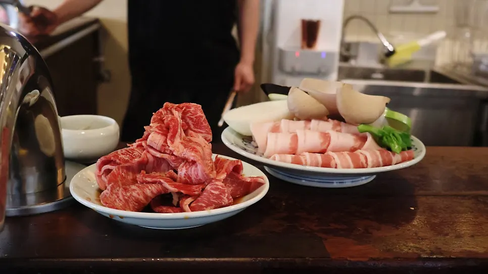 Meal with meat and a highball