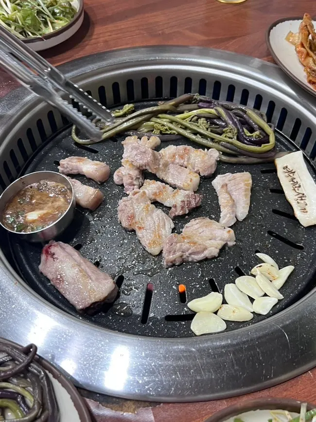 Scored and prepared plate of Jeju raw meat