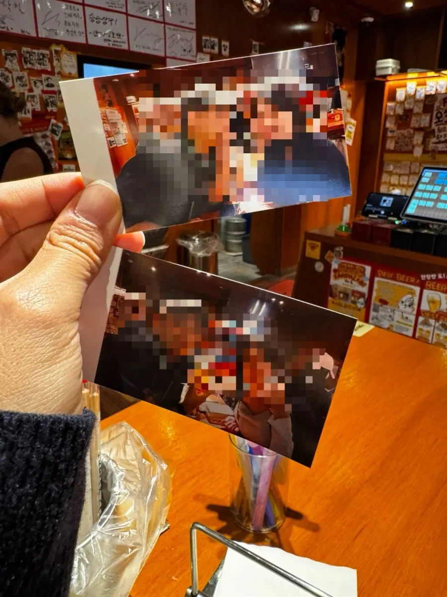 Two instant polaroid photos received on the spot