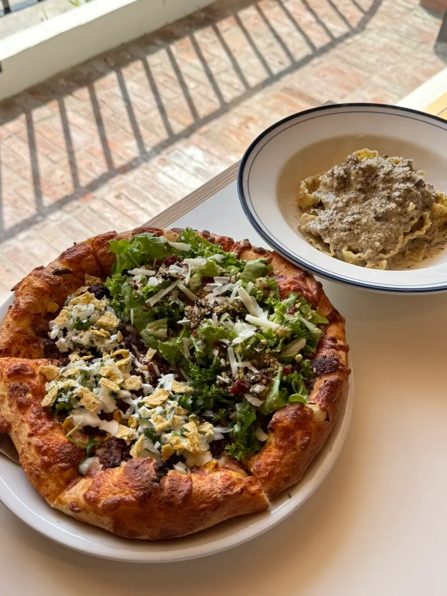 Neatly plated half-and-half pizza
