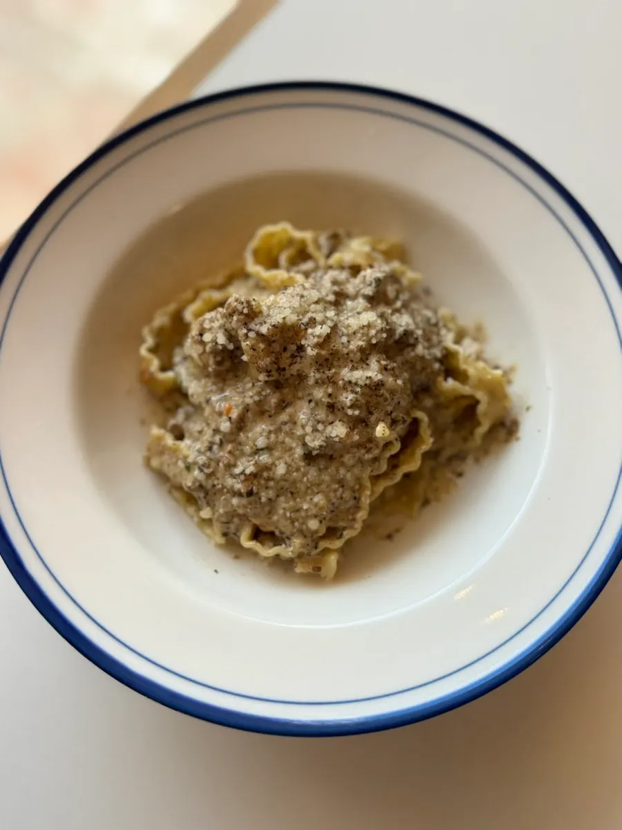 White ragu pasta with Reggiano cheese