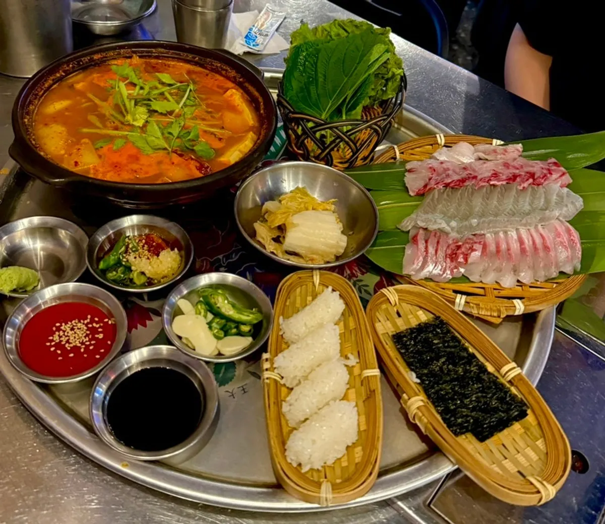 Full spread of the ₩45,000 live fish sashimi set