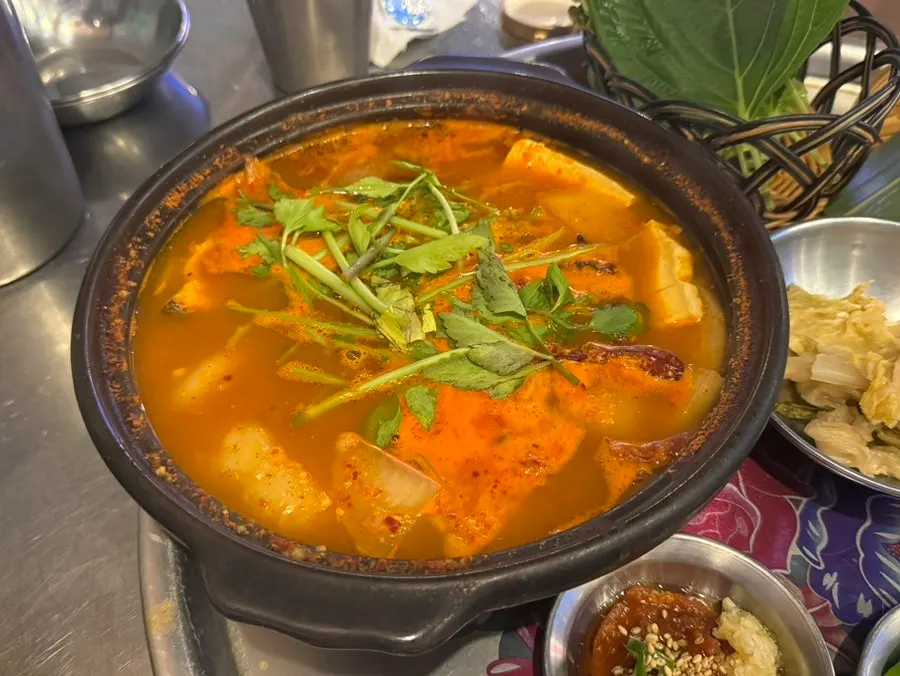 Spicy fish stew with tofu and hand-torn dough bits