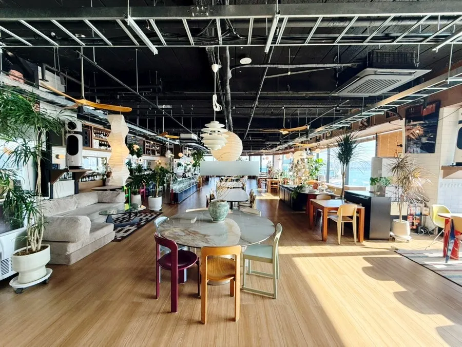 Dining hall at Working Holiday Minrak with spaced-out tables