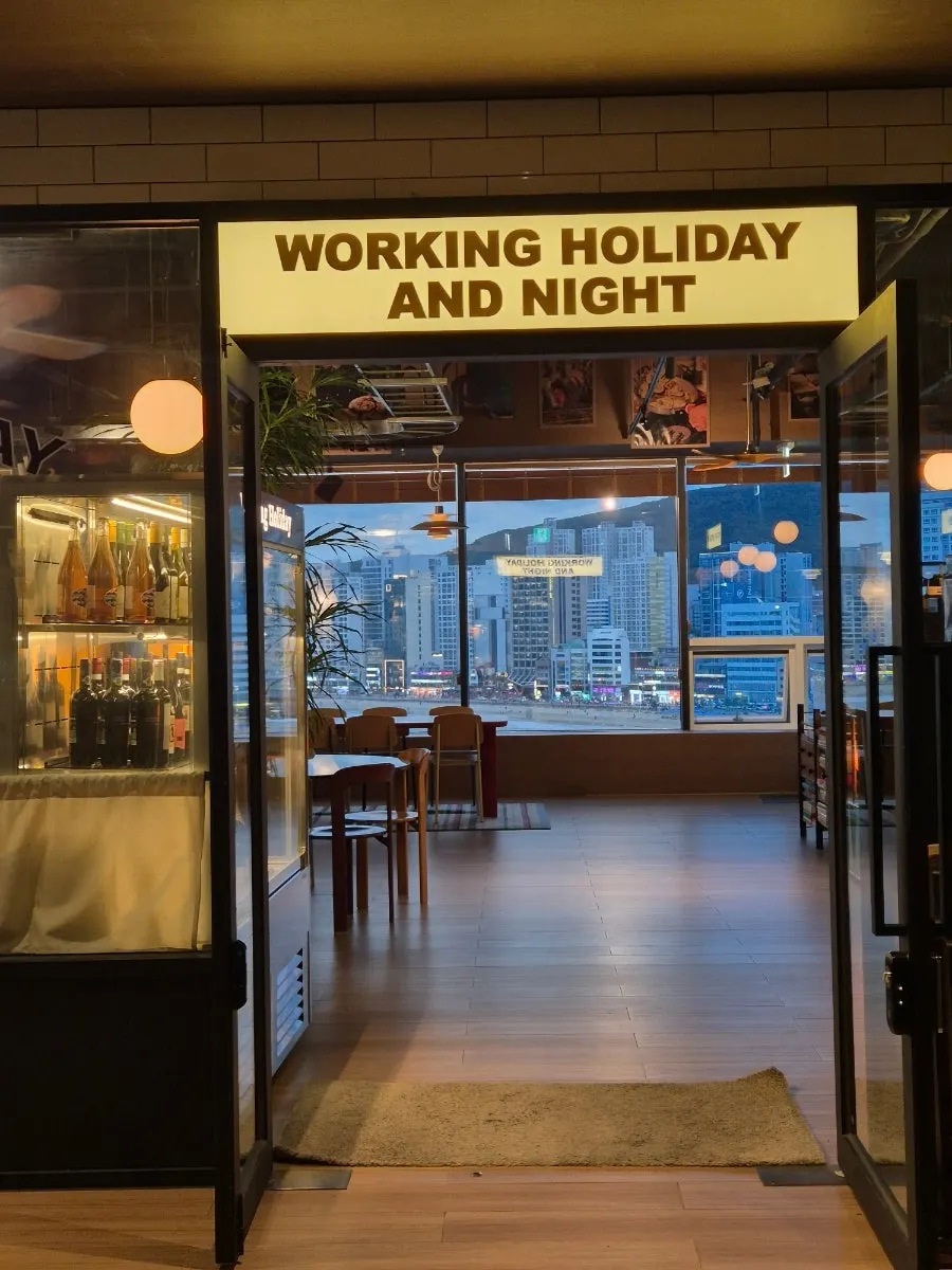 Entrance to Working Holiday Minrak on the 7th floor of the Badamaru building