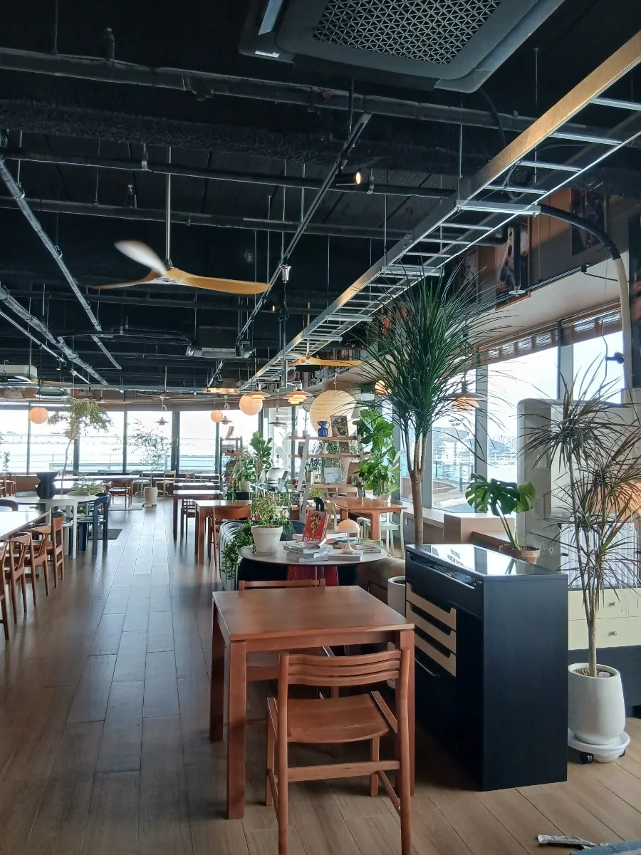 Interior of the high-ceilinged brunch café