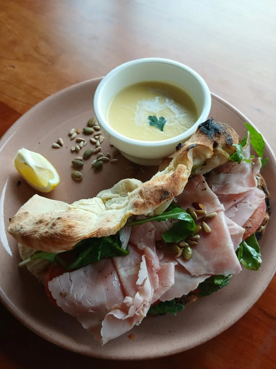 A plate of Panuozzo made with wood-fired dough