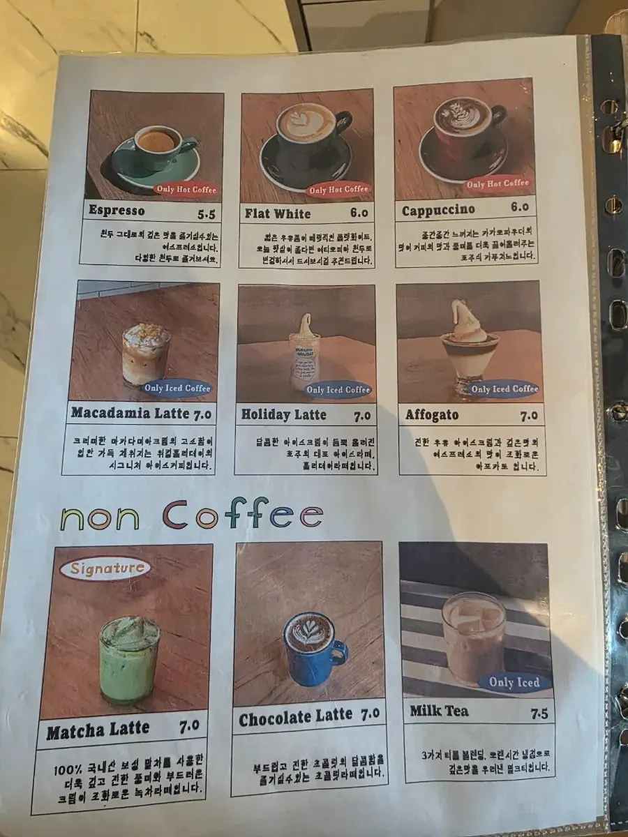 Menu board with coffee and drink prices