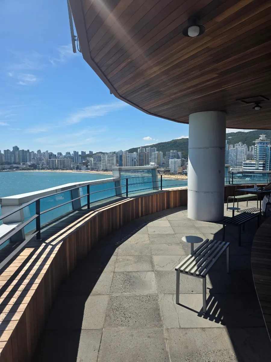 Terrace seating with a view of Gwangan Bridge