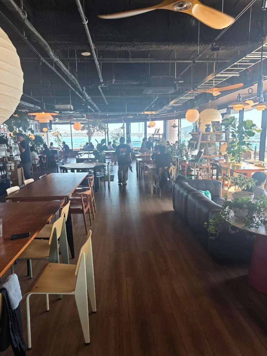 Wood-tone interior inside Working Holiday Minrak