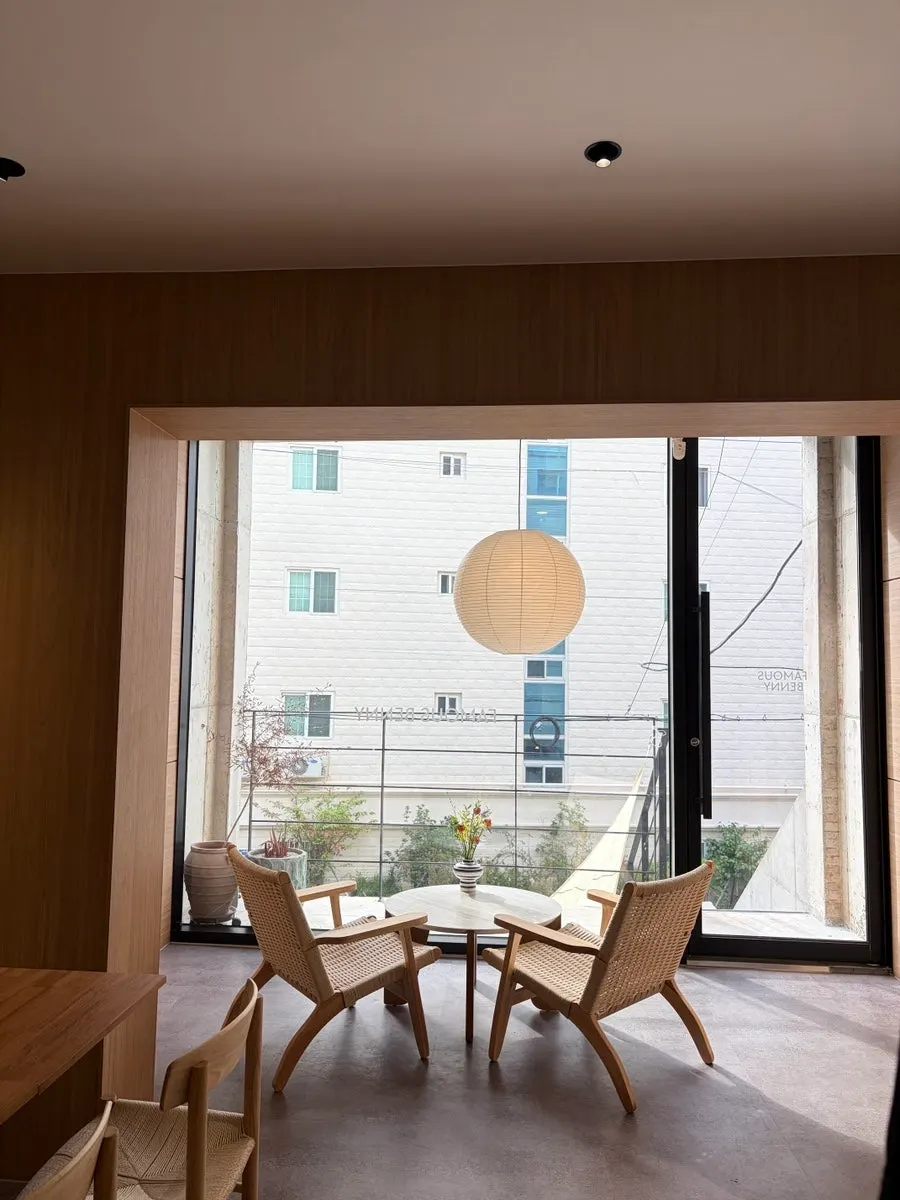 The café interior decorated in warm wood tones