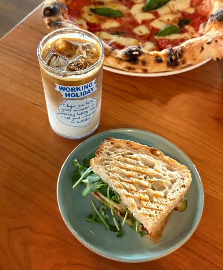 Margherita pizza and chicken sandwich