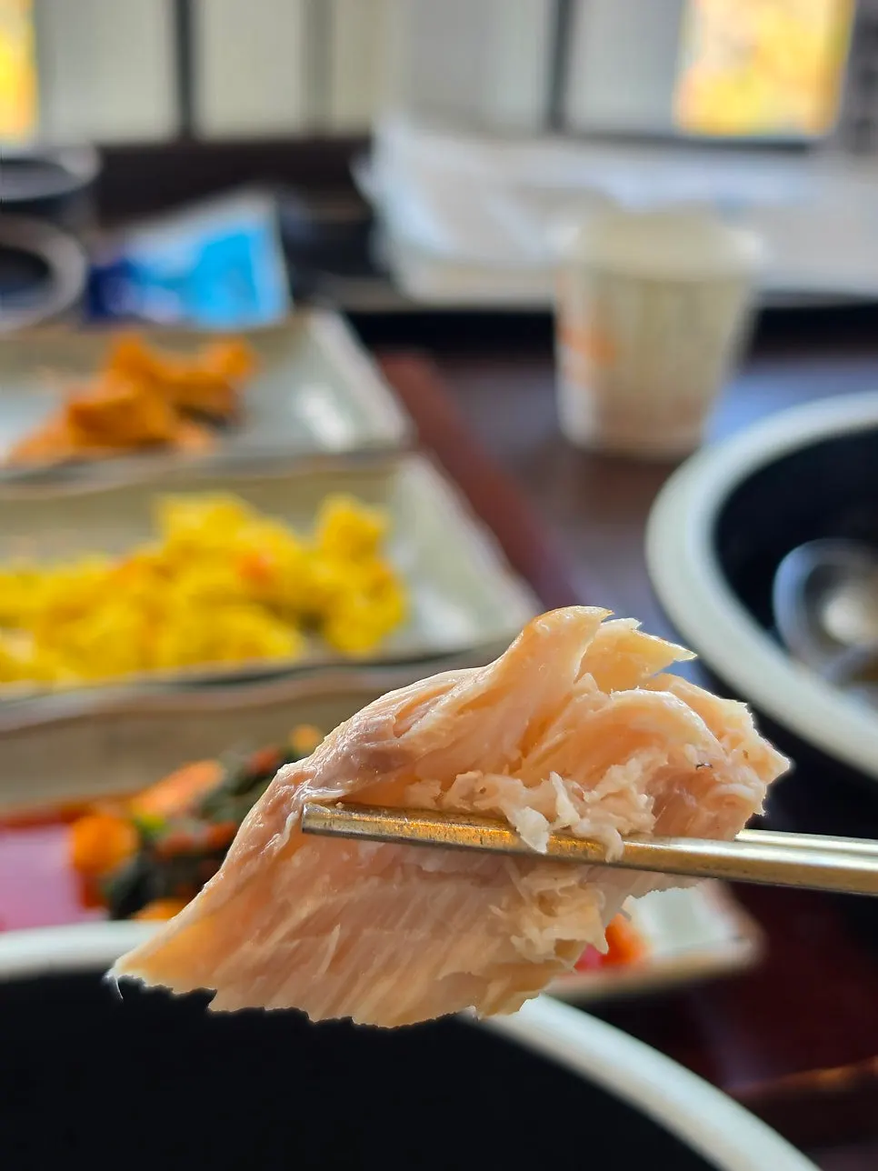 A thick piece of Spanish mackerel pulled apart