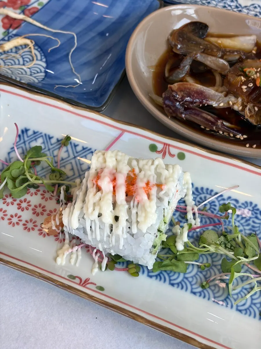 Soy-marinated crab and seasoned cockle accompaniments