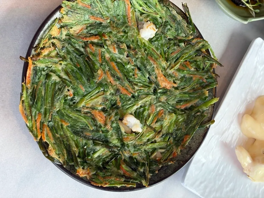 Soy-marinated crab and seasoned pufferfish skin