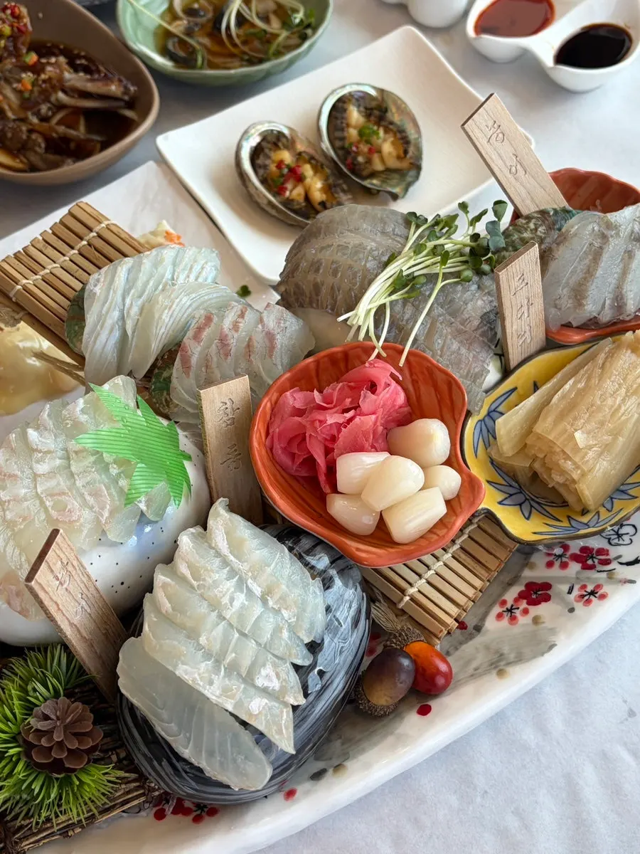 A plate of thick-cut assorted sashimi