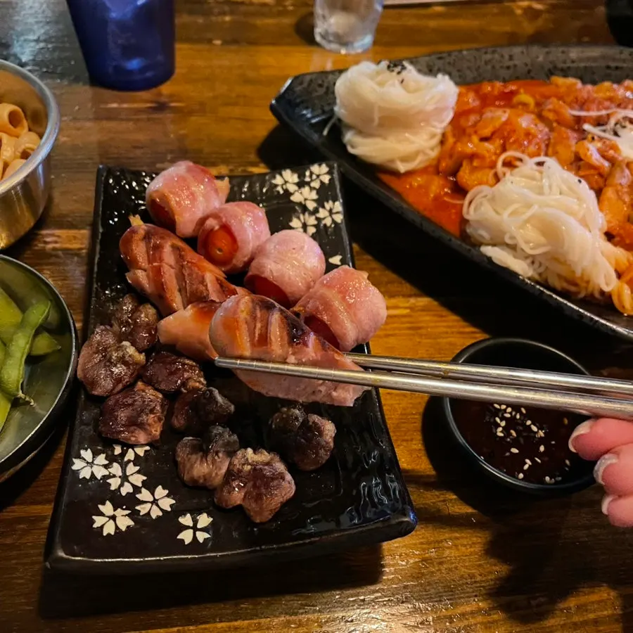 Grilled chicken heart and sausage skewers