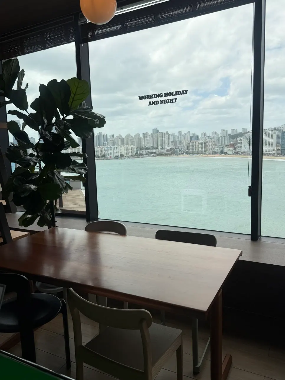Brunch table set with the ocean view outside the window