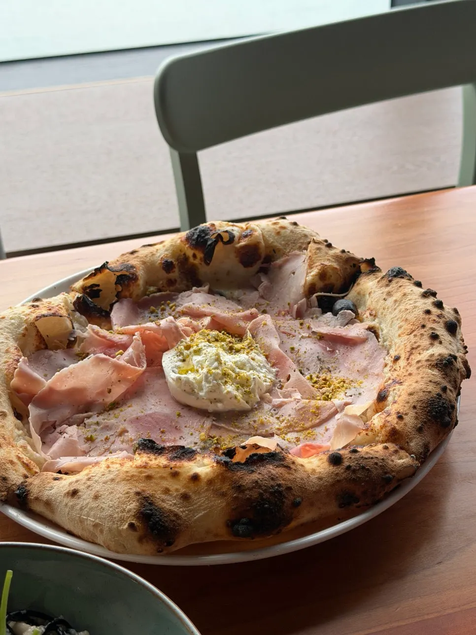 Close-up of a slice of jambon pizza