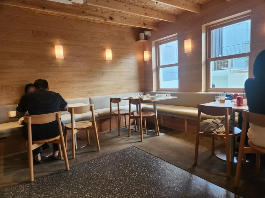 A section of the packed Extra Mile dining room