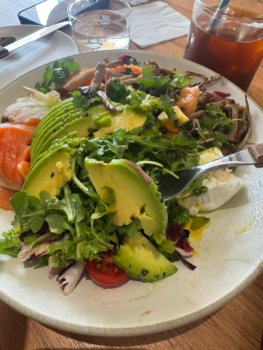 House salad topped with extra add-ons
