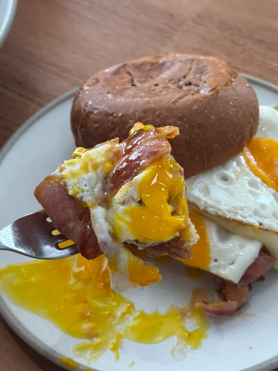 Bacon egg roll brunch dish