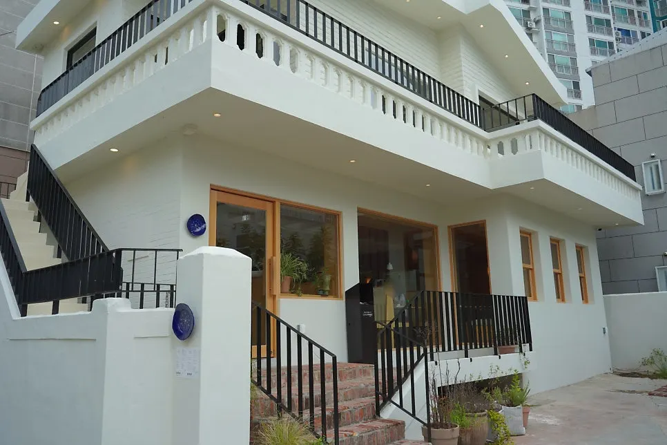 Exterior of Extra Mile tucked into a Gwangalli alley