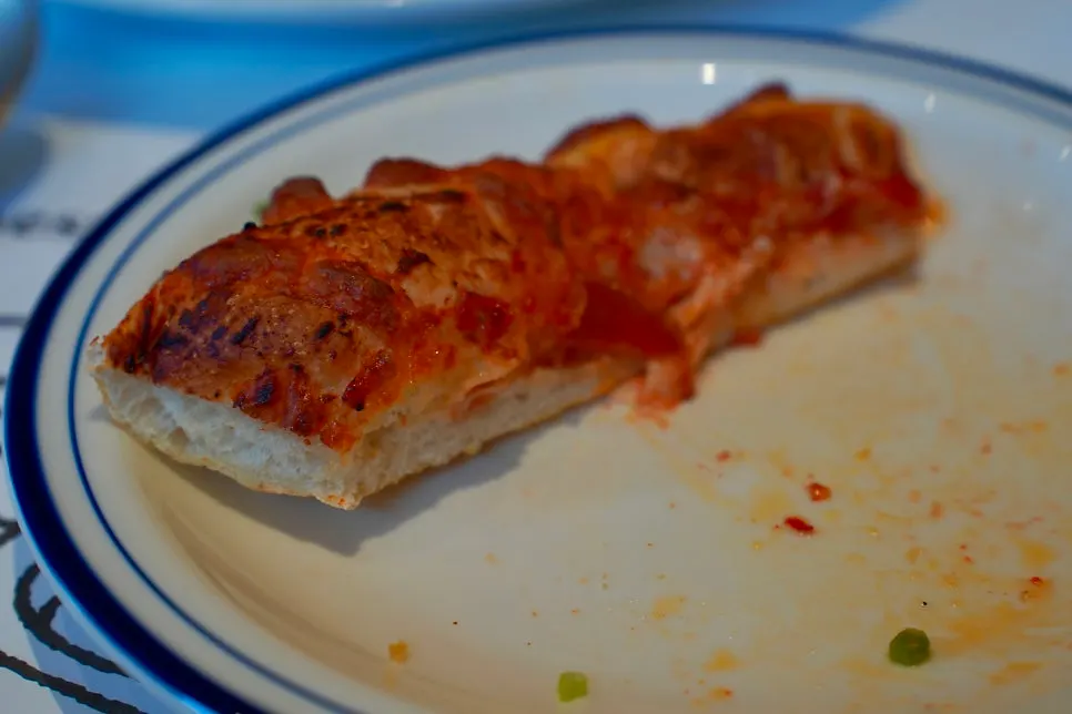 Close-up of the crust edge on the pepperoni pizza