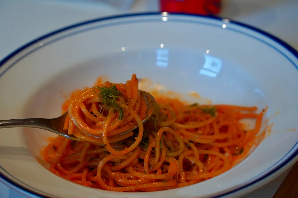 Plate of bisque cream pasta with a strong shrimp aroma