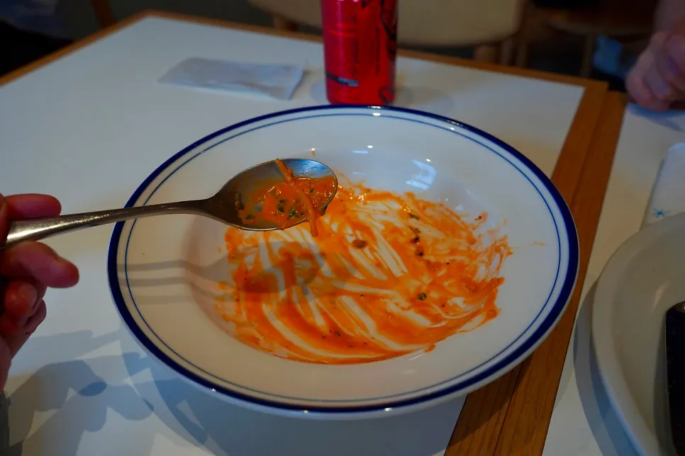 Bisque cream pasta noodles lifted on a fork