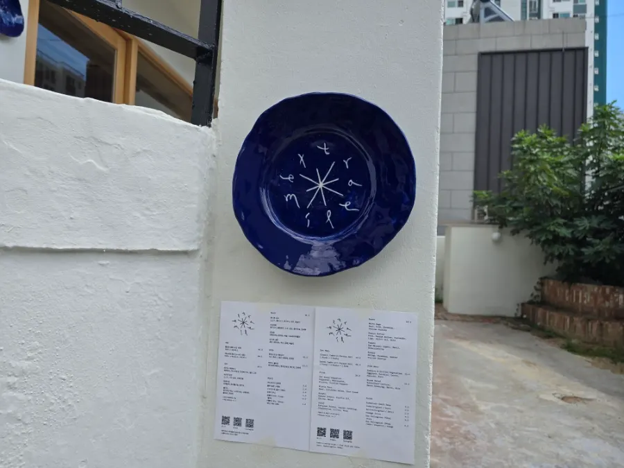 Menu information at the Extra Mile entrance