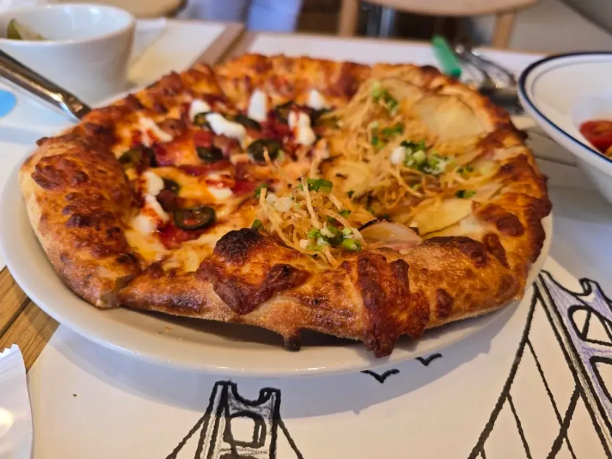 Half pepperoni and potato pizza