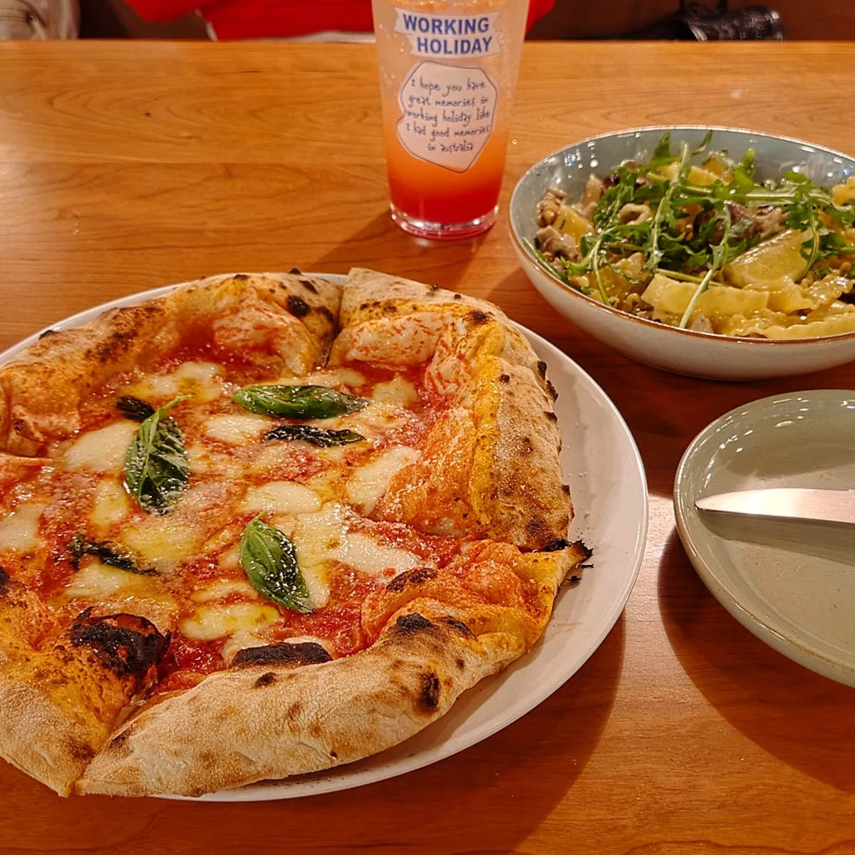 Hero image introducing the Gwangan Bridge view and wood-fired pizza