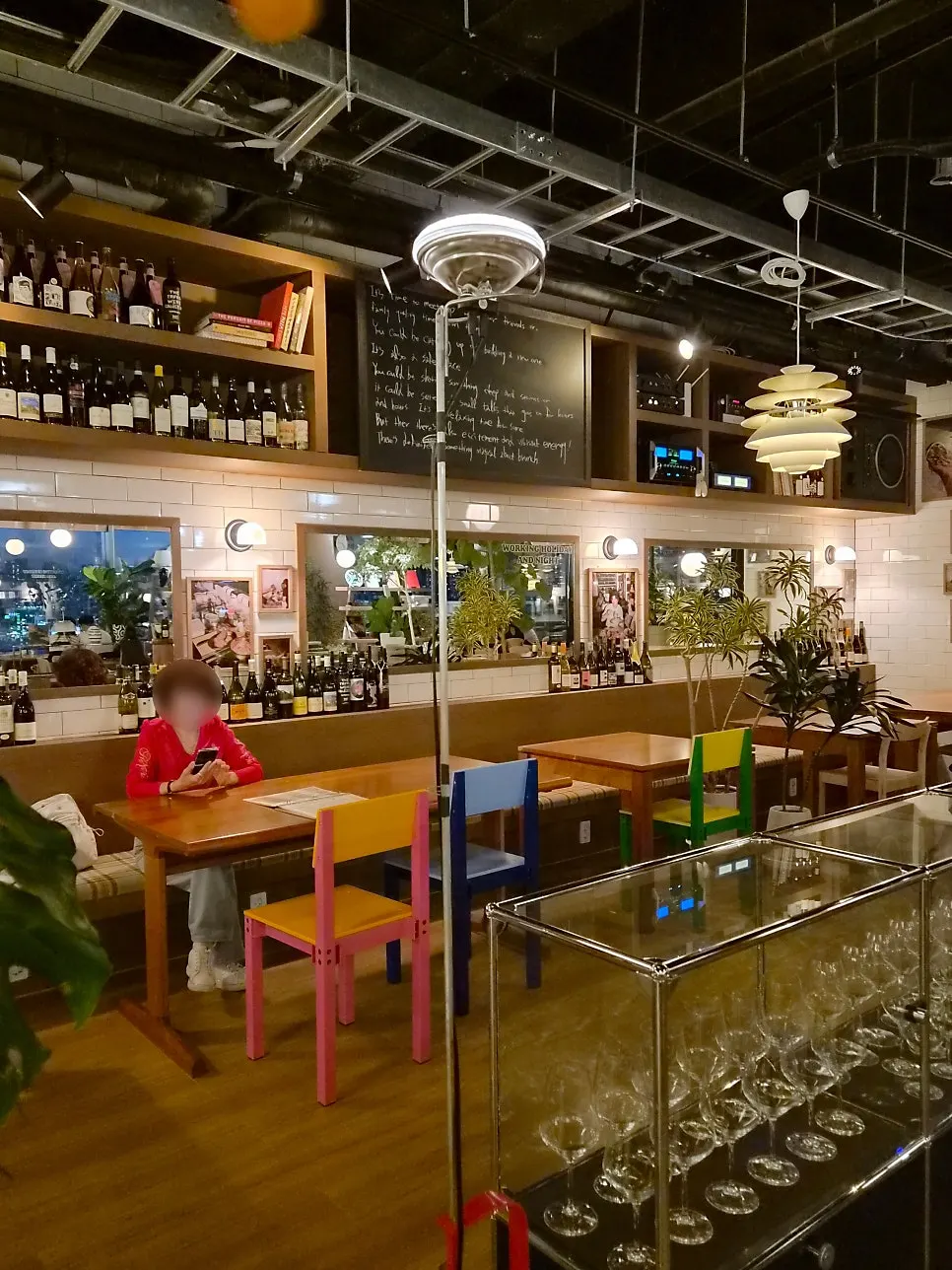 Sea and night view beyond the floor-to-ceiling windows