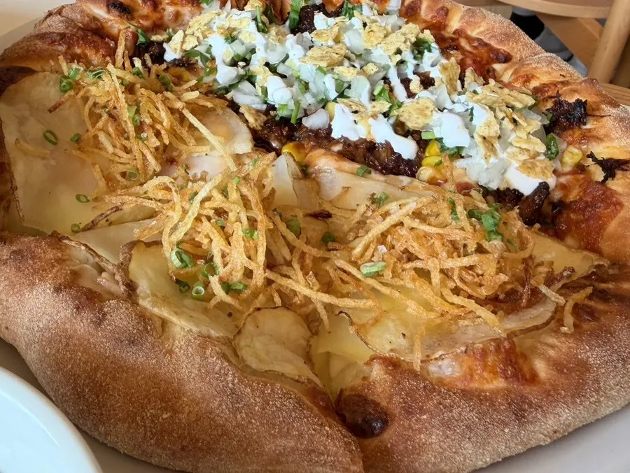Full view of the half-and-half pizza with added cheese crust