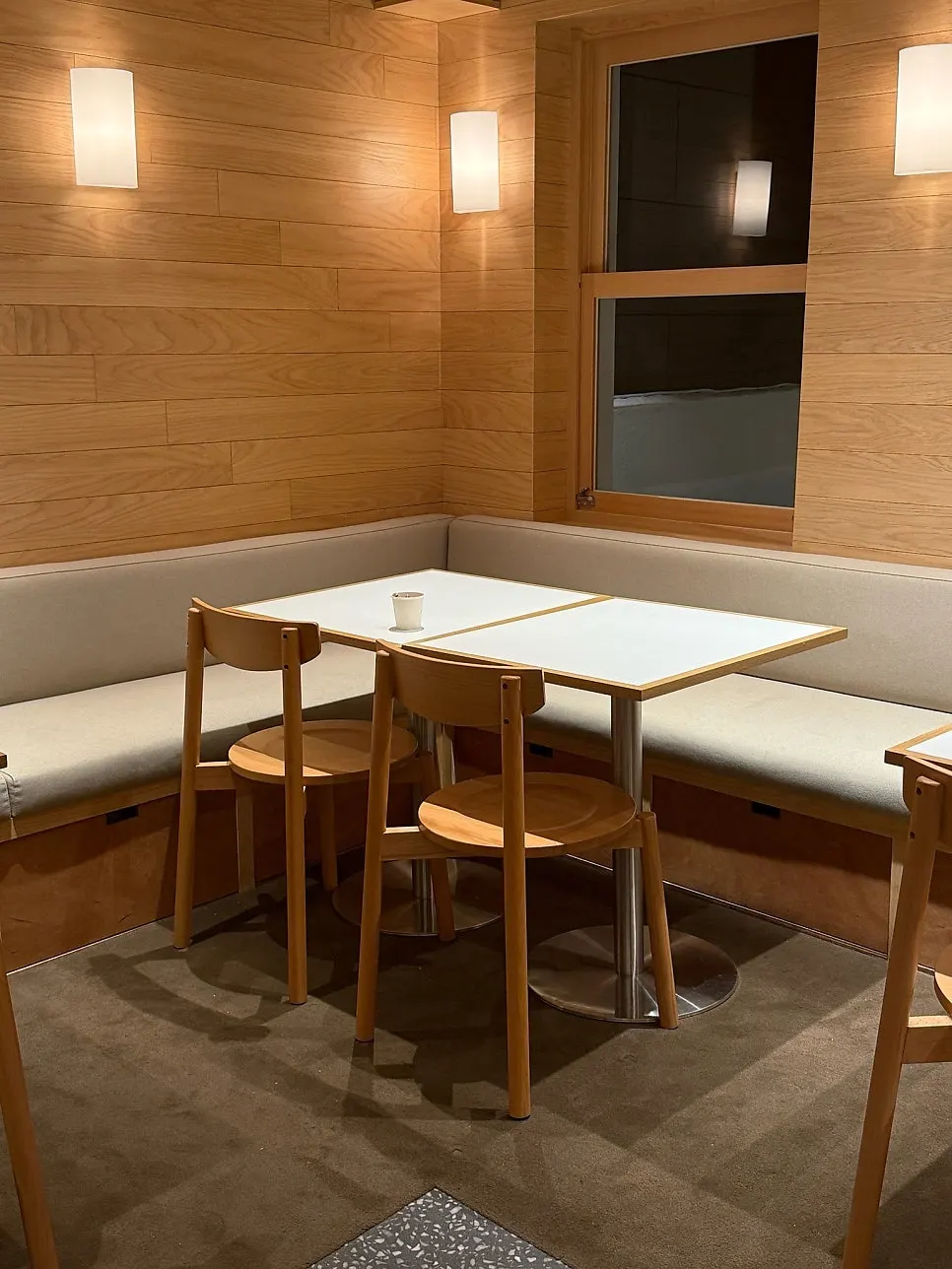 4-person table seating at Extra Mile